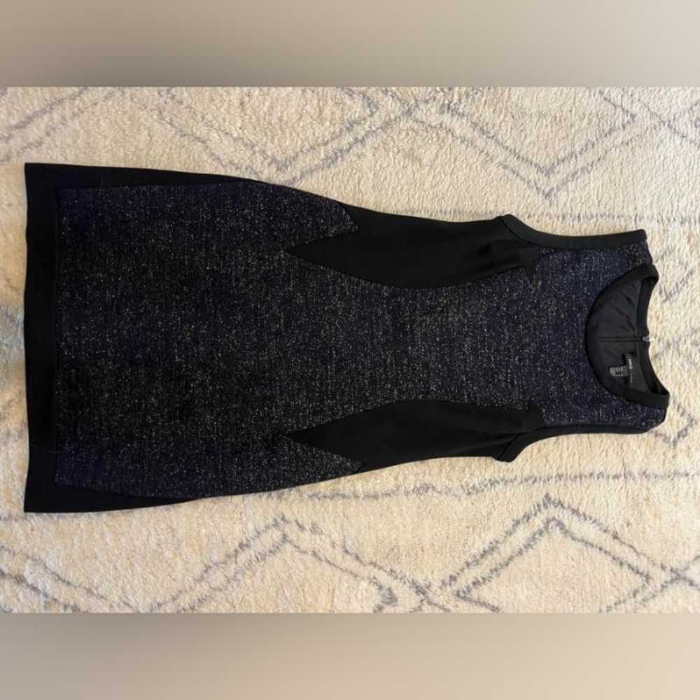 The brand is MNG/Mango, the is S, and the color is black.